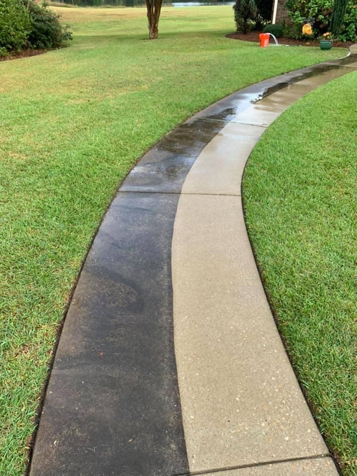 Sidewalk before and after pressure washing